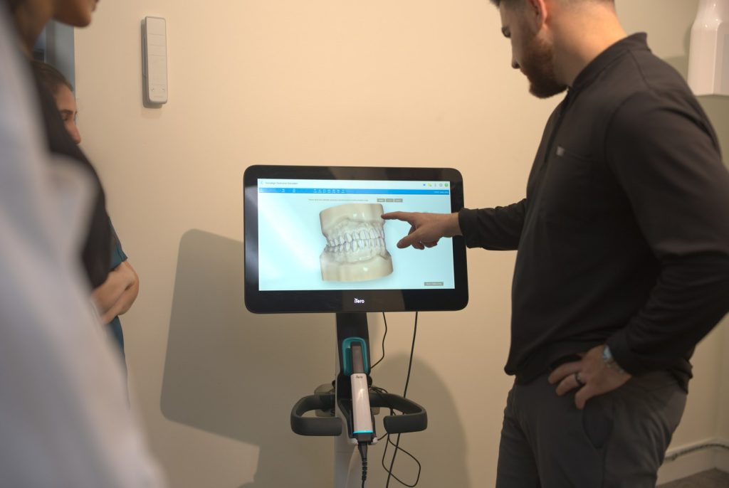 Dr. Mohammad Hammoud reviewing digital smile planning at 313 Dental